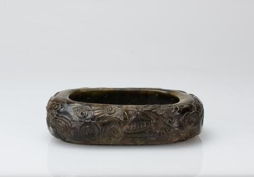 Ming/Qing-A Carved Jade ‘Cloud Dragon’ Washer with Mark