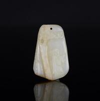 A White Jade Carved "Sage And Pine" Pendant