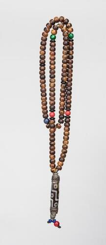 A Wood Beads Necklace and Tian Zhu Pendant