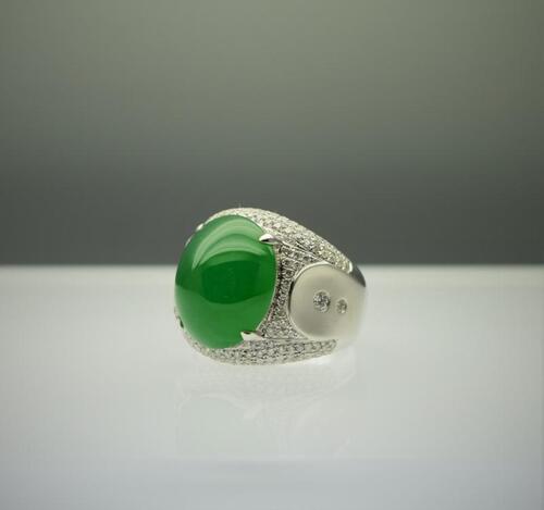 A Flawless High Dome Jadeite Cabochon Diamond Ring