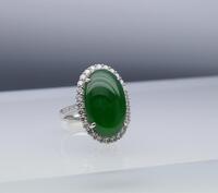 A Large Intense Green Jadeite Jade Diamond Ring