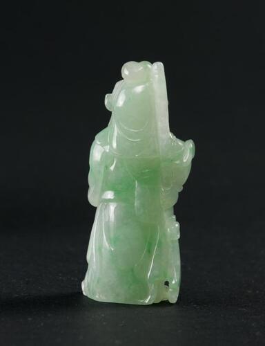 Qing - A Translucent Green Jadeite Carved Quan Gong