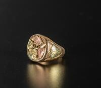 A Rose Gold and 10K Gold Man Ring by 'Black Hill Gold' Company
