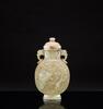 Qing - A Russet White Jade ‘Dragon’ Double Elephant Ring Handle Cover Vase