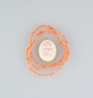A Coral Nicklace And Pendant