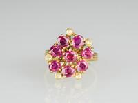 A Ruby Mounted With Diamond Gold Ring