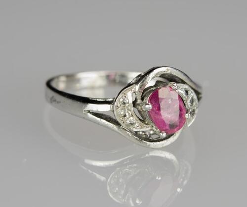 A Ruby and Diamond Mounted White Gold Ring Ring Size: 6