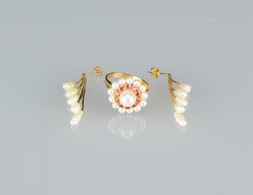 A Set Of Pearl Earring And Pearl Ring