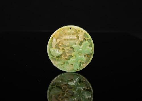 A Jadeite Carved Qilin and Lotus Circular Pendant