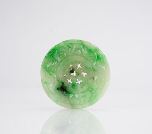 An Apple Green Jadeite Carved Circlear Pendant