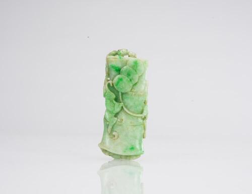 A Green Jadeite Carved 'Bat,Bamboo' Pendant