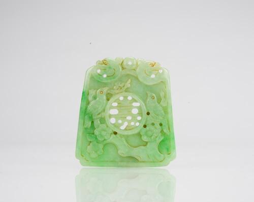 A Green Jadeite Carved Magpie and Shou Pendant
