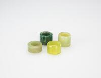 A Jadeite And Three Gray Green Jade Ring (4 Ps)