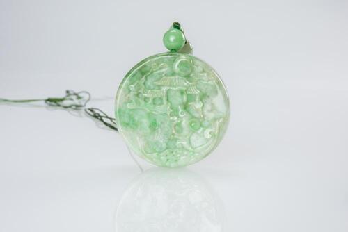 A Jadeite Pendant Carved Koi Fish