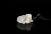 Qing - A White Jade Carved 'Lion and Bady Lion Pendant