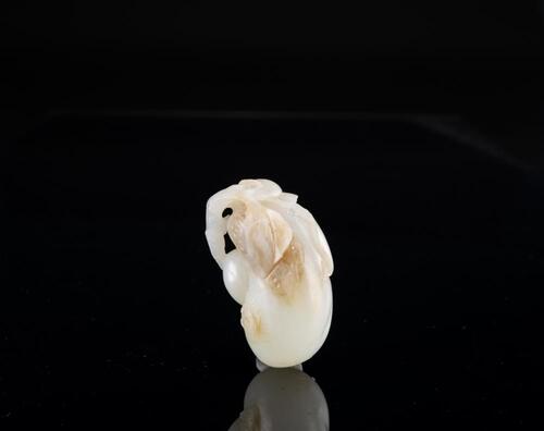 Late Qing/Republic -A White Jade Carved 'Melon' Pendant