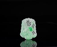 A Translucent Apple Green Jadeite Carved 'Koi and Peach' Pendant