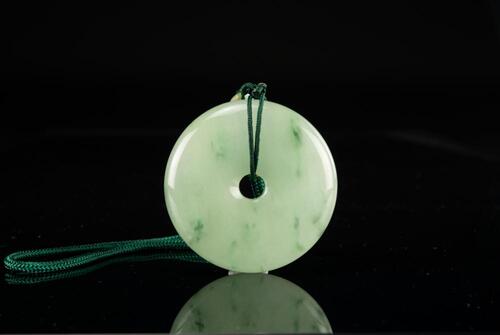 A Translucent Jadeite Disc Pendant