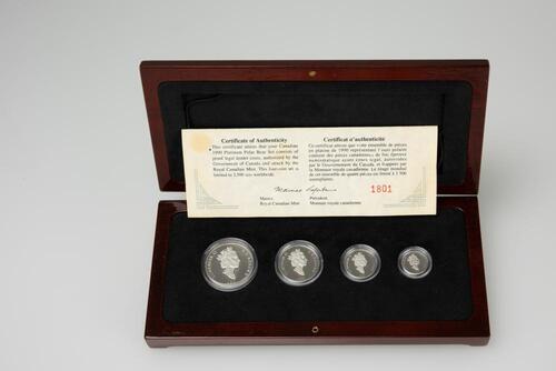 A Four 1990 Platinum Polar Bear Set Coins,