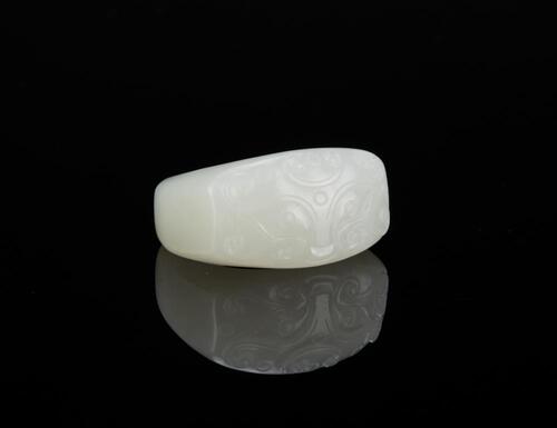 Late Qing- A White Jade Carved Archer Ring