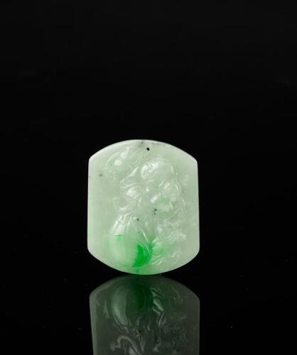 A Semi Translucent Green Jadeite Carved " Buddha " Pendant