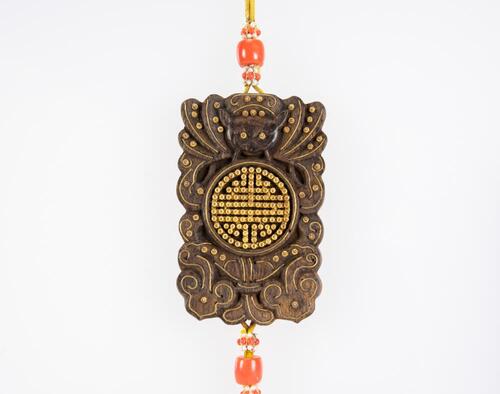 An Agalloch Wood Pendant Carved "Fu,Shou" with Inlaid Gold