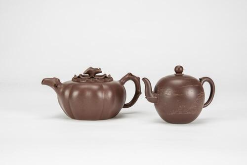 A Group Of Two Zisha Tea Pot