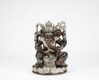 Early 20th Century-A Ebony Wood Ganesha In Laid Silver