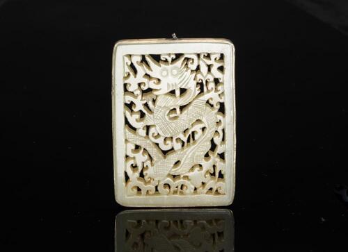 Late Qing-A White Jade Carved "Dragon" Pendant
