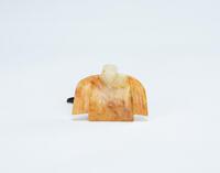 A Russet White Jade Carved Eagle Pendant