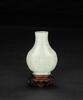 Qing- A White Jade Vase H: 10 cm