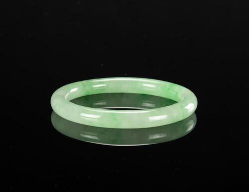 A Translusent Green Jadeite Bangle