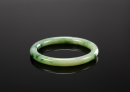 A Green Jadeite Bangle