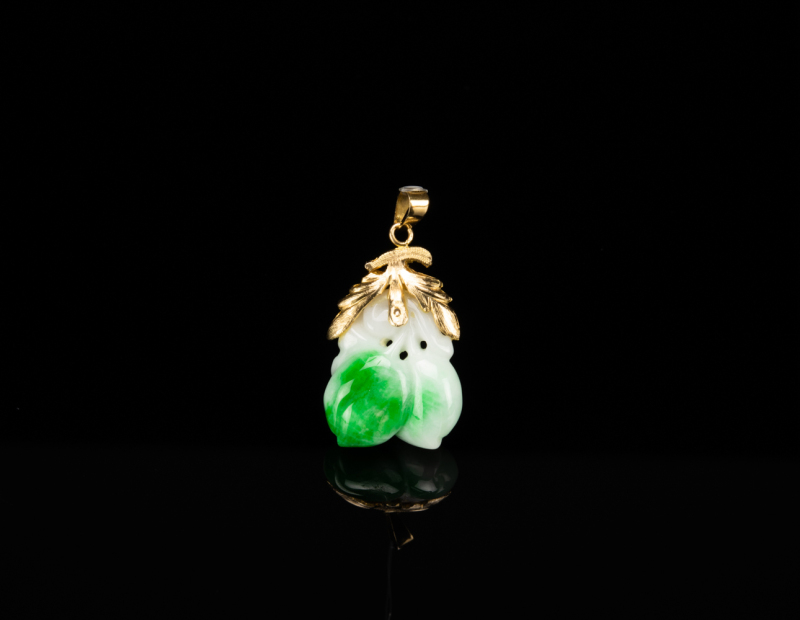 A Green Jadeite Carved Double Peaches Mounted 18K Gold Pendant