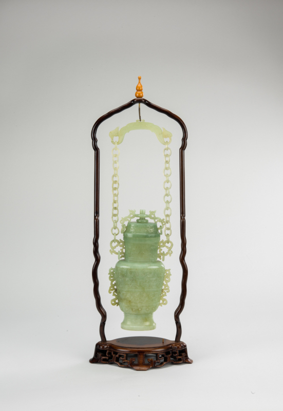 Republic-A Green Jade Cavred Dragon Hanging Vase With Cover (woodstand)