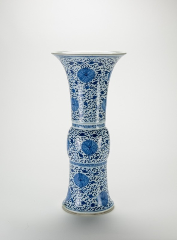 Qing - A Blue And White ‘Flowers’ Beake Vase.