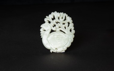 Late Qing/Republic - A White Jade Carved Peacock Pendant