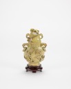 Qing - A Yellowish Green Jade Carve ‘Chilung’ Vase And Cover