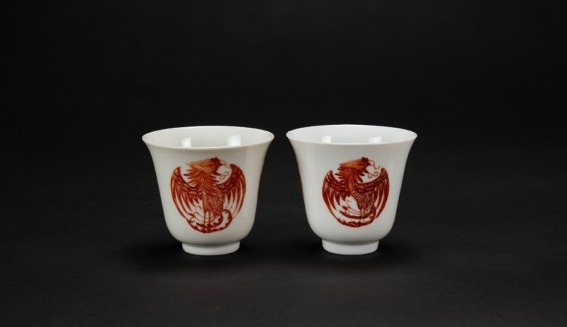 An Pair Of Iron-Red Phoenix Cups.