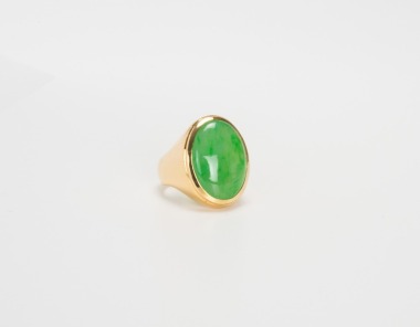 A Green Jadeite Mounted In 18K Gold Ring