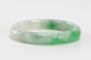 A Semi-Translucent Green Jadeite Carved ‘ Flowers’ Bangle - 3