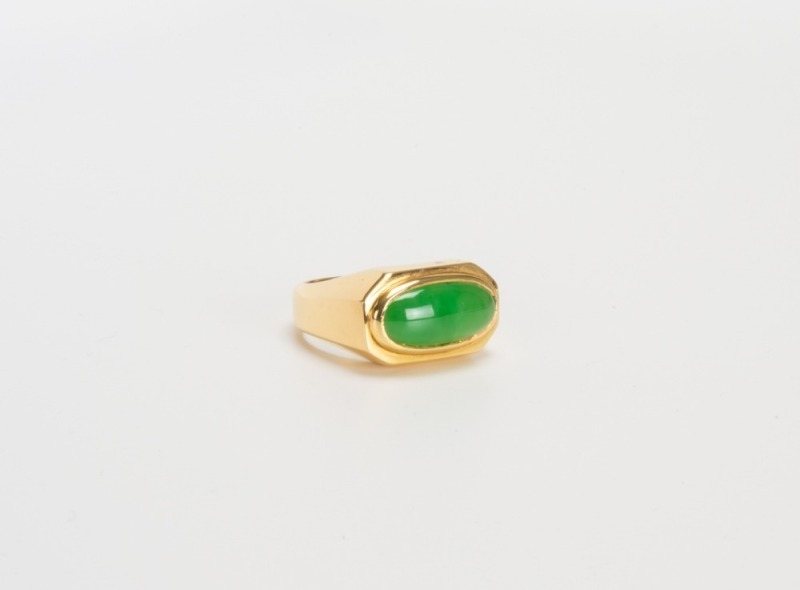 A Green Jadeite Mounted In 18K Gold Ring