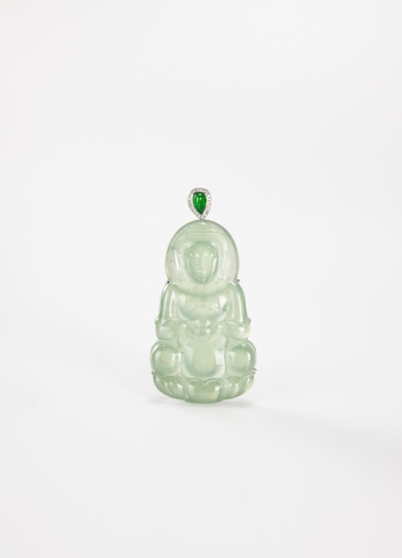 A Semi-Translucent Jadeite Carved Guanyin Pendant