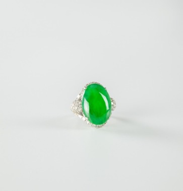 A Translucent Cabochon Jadeite Ring Mounted With 14K White Gold And Diamonds
