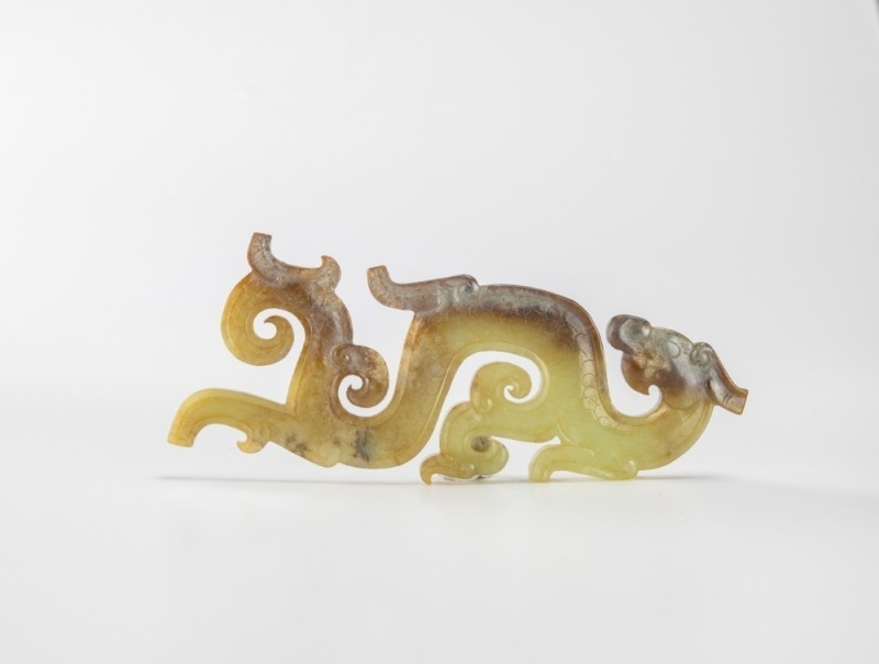 Warring State Period- A Greenish Jade Dragon- Shaped Pendant