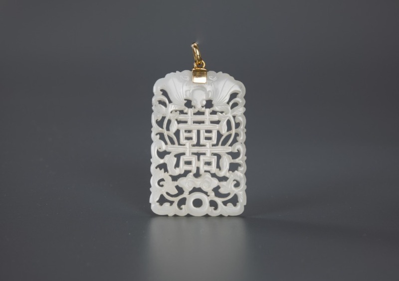 Qing - A White Carved ‘Bats And Double Happiness’ Pendant