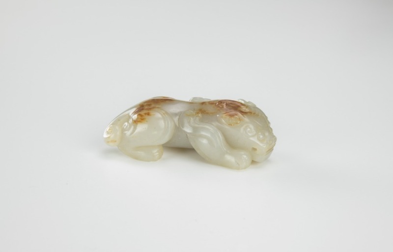 Ming/Qing-A Russet White Jade Carved Beast