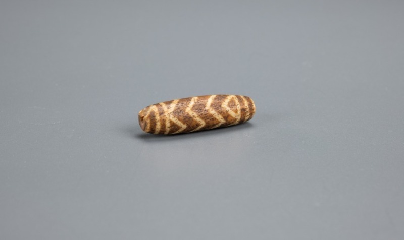 A Pumtek Tube Bead