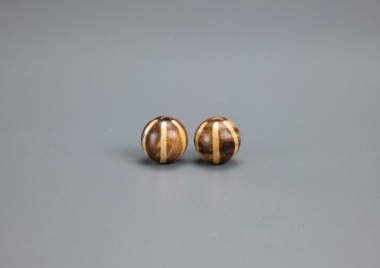 A Pair Of Pumtek Round Beads