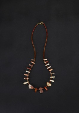 A Red Agate Beads Neckace With Red Agate Ornaments